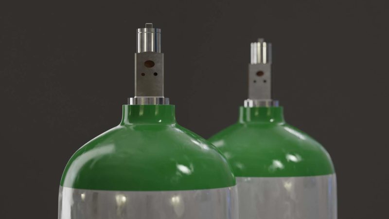 Two green oxygen bottles